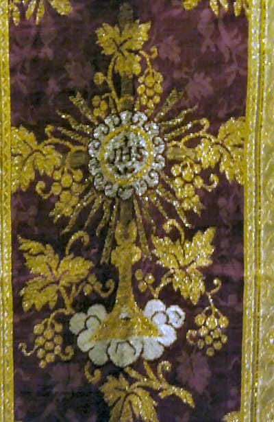 A detail of an historic chasuble at the museum at Mission Santa Ines showing intricate needlework