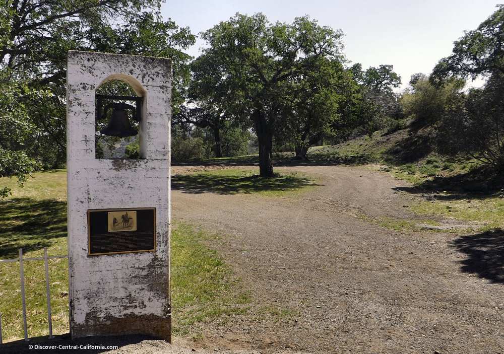 Bell and plaque at a ranch entrance