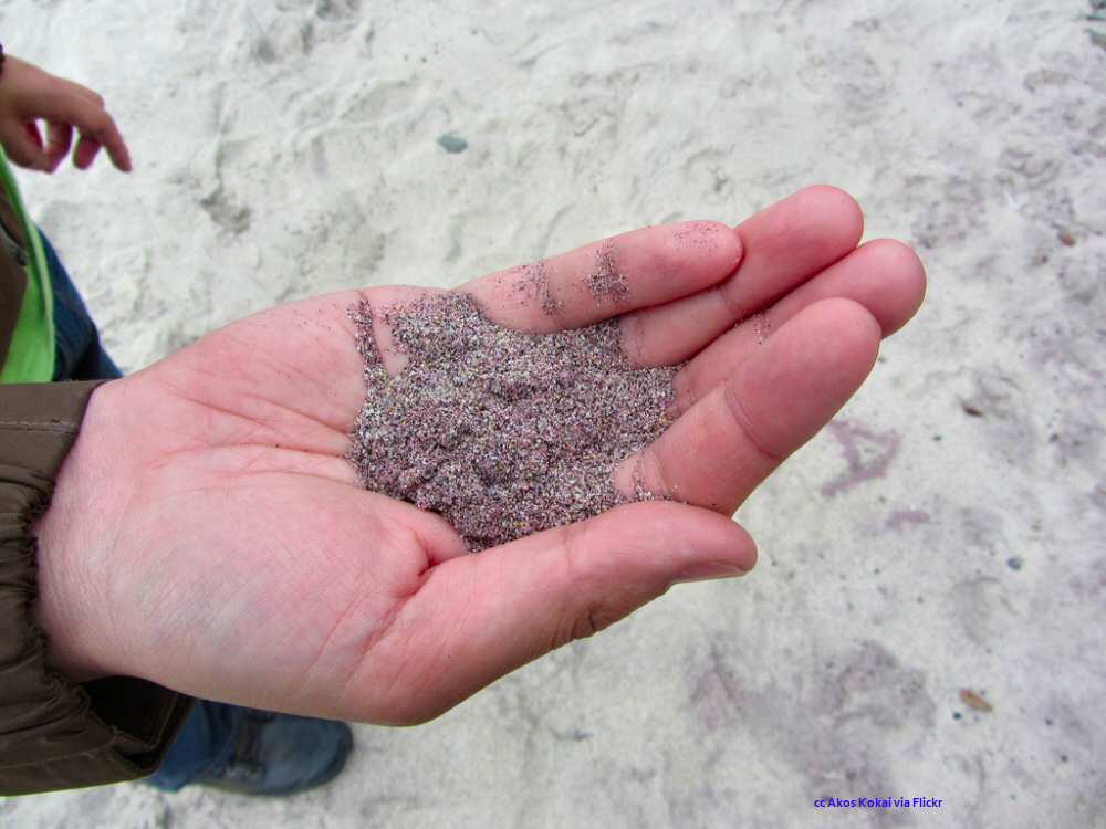 Pfeiffer Beach purple sand in hand