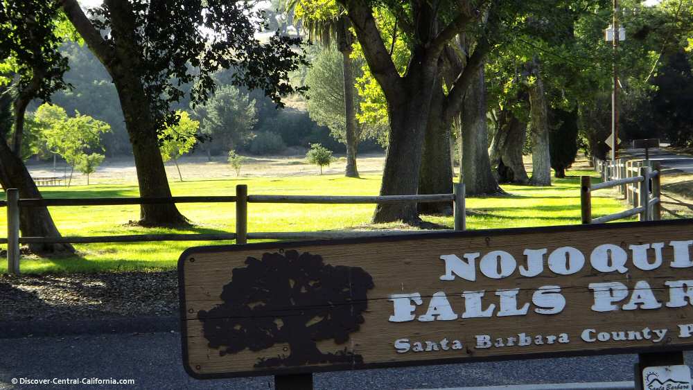 A sign that says nooquie falls park in santa barbara county.