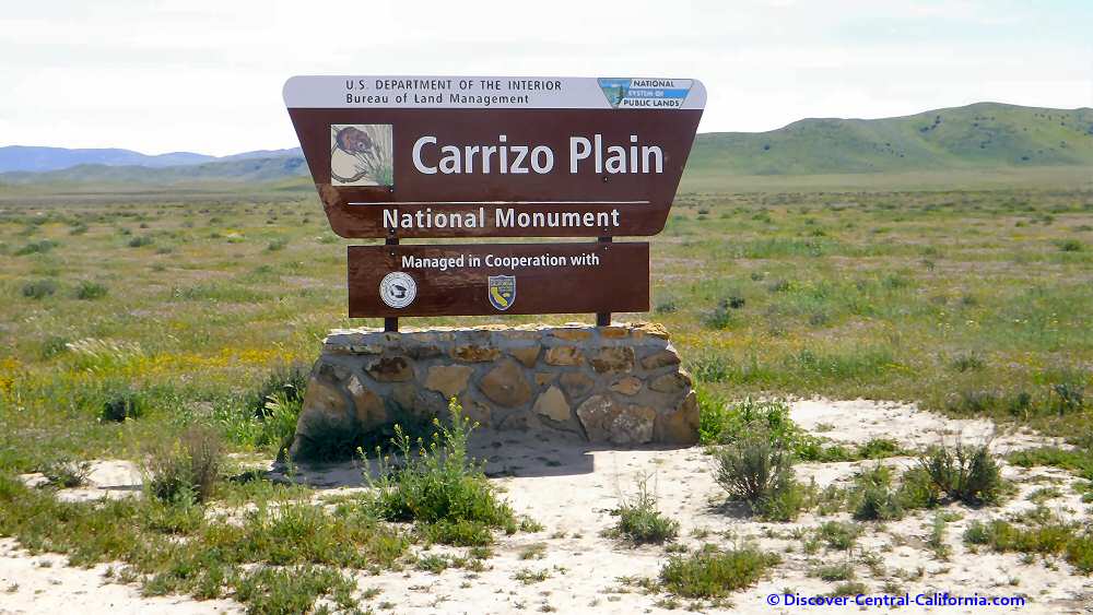 A sign for carriz plain national monument in the desert.