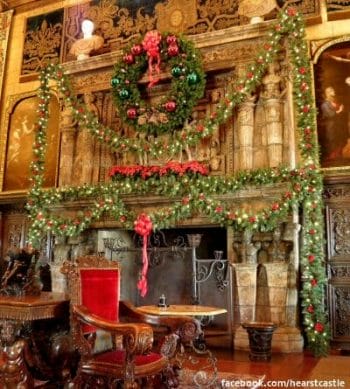 One of the grand fireplaces at Hearst Castle decorated lavishly with wreath and garlands